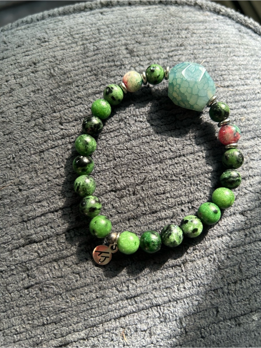 T Jazelle one of a kind Green Beaded Stretch Bracelet with Faceted Aqua Accent